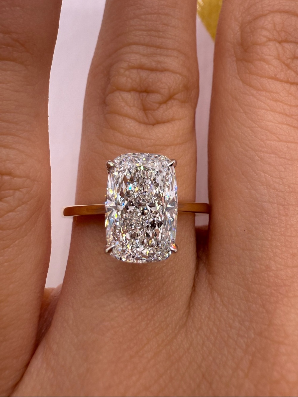 3.05 carat E VS1 elongated cushion solitaire with tulip basket engagement ring